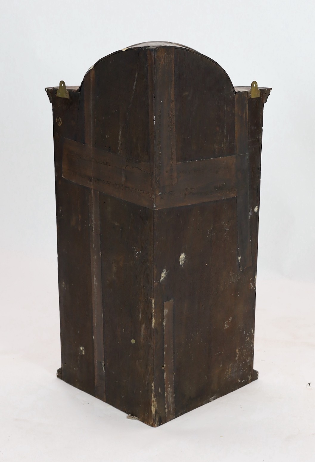 A Queen Anne walnut hanging corner cupboard, width 64cm, depth 34cm, height 104cm